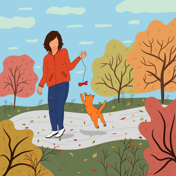 Fille joue avec un chat dans le parc en automne. Jeune fille en veste et jeans sur la piste avec les feuilles tombées dans le pays. Vacances actives avec les animaux domestiques
. - Vecteur, image