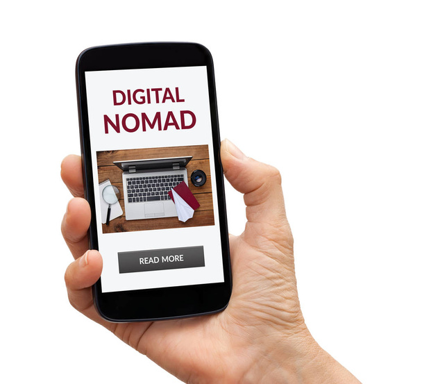 Χειρός κρατώντας έξυπνο τηλέφωνο με ψηφιακή έννοια nomad στην οθόνη - Φωτογραφία, εικόνα