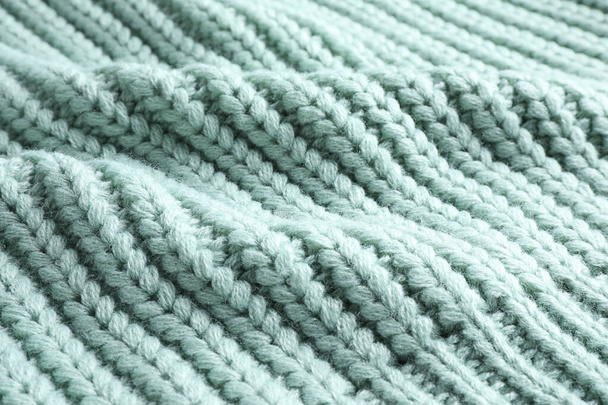 Warm knitted sweater as background, closeup view - Φωτογραφία, εικόνα