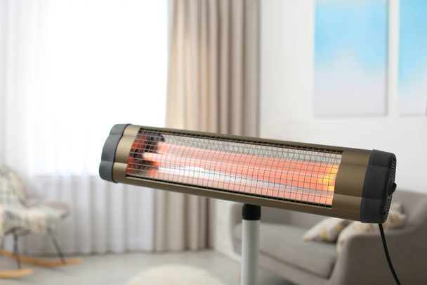 Modern electric infrared heater at home, closeup - Photo, Image