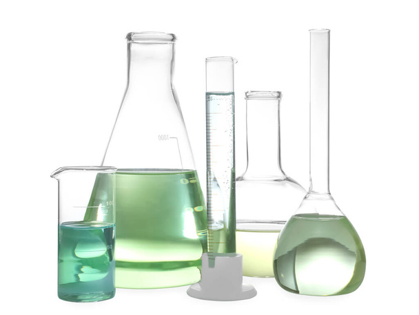 Glassware with liquids isolated on white. Laboratory analysis - Photo, Image