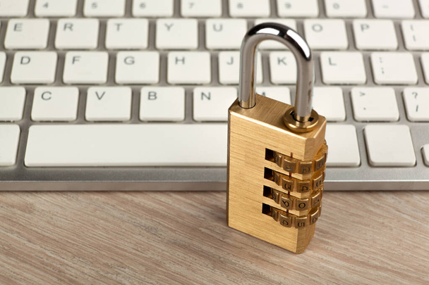 padlock with a computer keyboard Internet security concept - Photo, Image