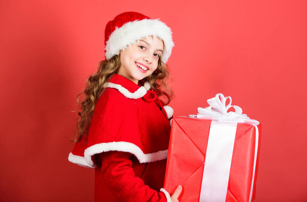 Happy new year concept. Unpacking christmas gift. Winter holiday tradition. Opening christmas gift. Kid happy with christmas present. Dreams come true. Girl celebrate christmas open gift box - 写真・画像