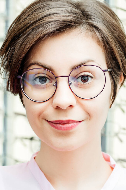 Portrait of smiling girl with glasses - Zdjęcie, obraz