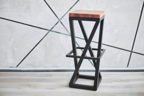 stylish bar chair made of wood and metal. - Foto, afbeelding