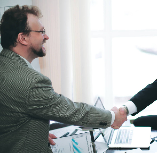 business partners shaking hands during business meeting - Φωτογραφία, εικόνα