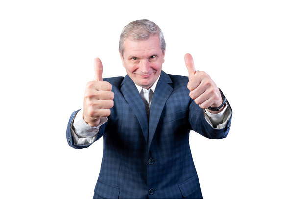Elderly man in a suit shows thumb up. Isolated on a white background. - Foto, imagen