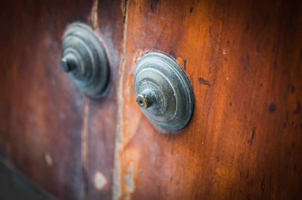 old doors close up view - knobs, design elements, architecture of the ancient doors within the streets of the spanish cities - 写真・画像