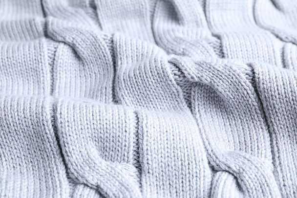 Warm knitted sweater as background, closeup view - Valokuva, kuva