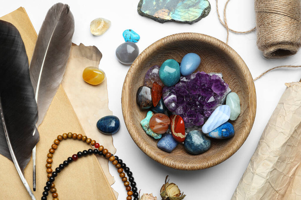 Flat lay composition with different gemstones on white background - 写真・画像