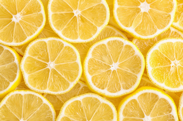 Slices of fresh lemon as background, top view - Foto, immagini