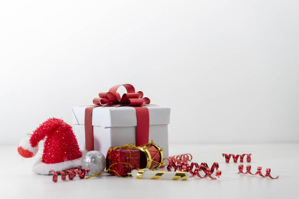 Red open gift box party objects on white background - Φωτογραφία, εικόνα