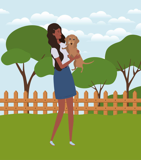 młody afro kobieta podnoszenie słodkie pies w polu - Wektor, obraz