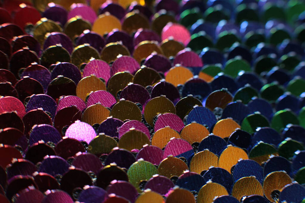 Shiny texture background iridescent multicolor sequins macro photo - Photo, Image