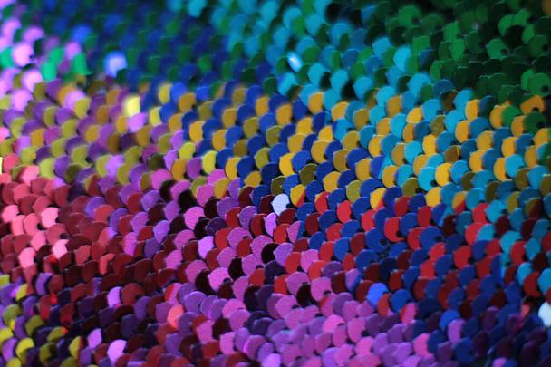 Textura brillante fondo lentejuelas multicolores iridiscentes macro foto
 - Foto, imagen