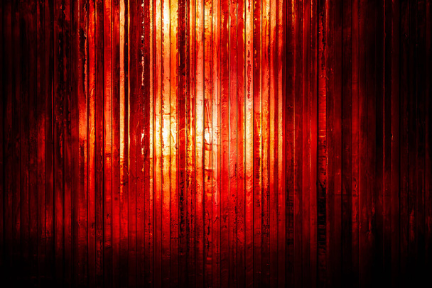 Thick bright red glass with light shining through from the back - Photo, Image