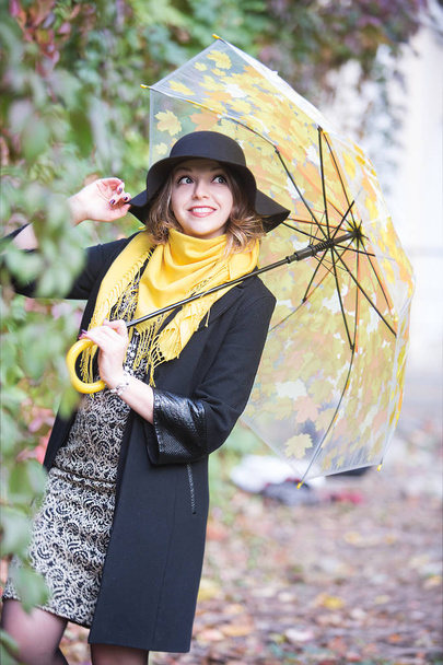 happy beautiful young woman under umbrella - Fotografie, Obrázek