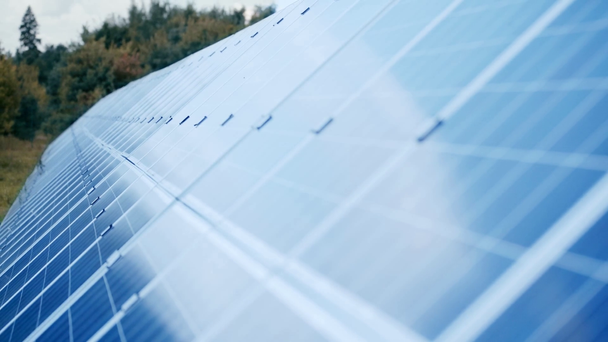 selective focus of blue solar batteries outside  - Záběry, video