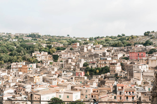 sunshine on roofs of old houses in modica, italy  - Fotó, kép
