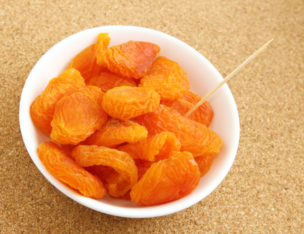 Dried apricots with toothpick - Photo, Image