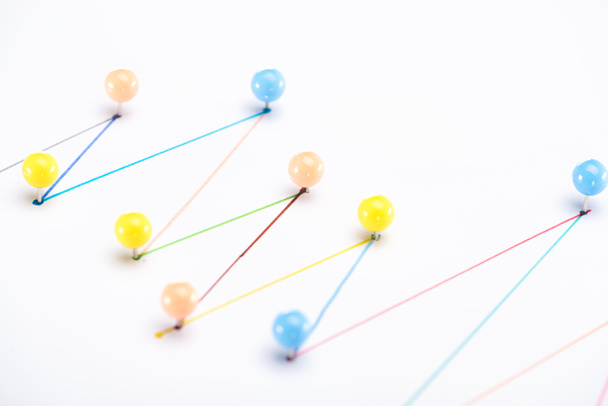 close up view of colorful connected drawn lines with pins, connection concept - Photo, Image