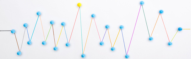 top view of colorful connected drawn lines with pins, connection concept - Photo, Image