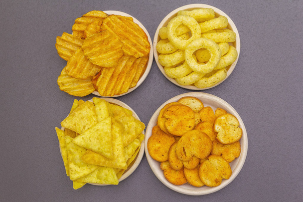 Assorted salty spiced snacks. - Photo, Image