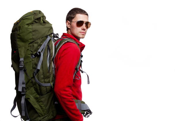 Hiker with backpack standing at white background - Fotoğraf, Görsel