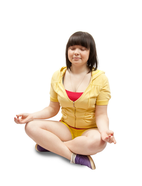 Girl practicing yoga over white - Photo, image