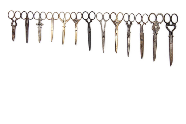 set of antique shears in a row isolated on a white background - 写真・画像