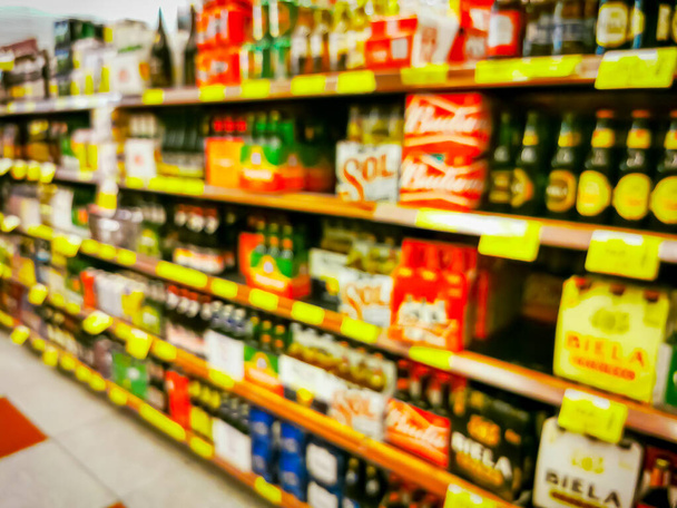 Convenience store shelves interior blur background , Blurred Supermarket shelves. - 写真・画像