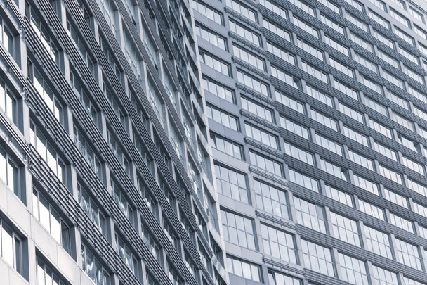 A part of abstract modern office building, skyscraper close up background - Valokuva, kuva