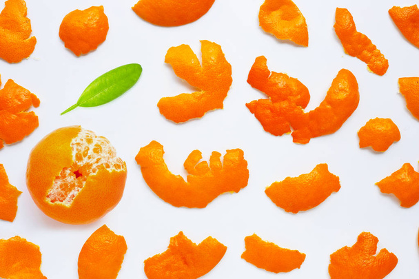 Orange with peel on white background.  - Фото, изображение