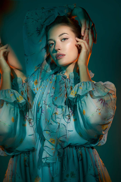 Beautiful lady in blue chiffon dress - Valokuva, kuva