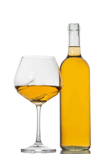 bottle and glass with white wine  - Zdjęcie, obraz