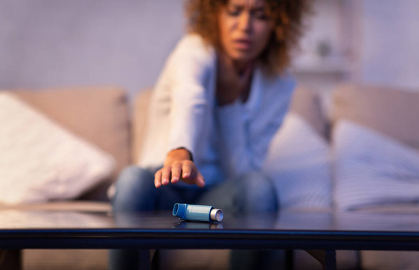 Asmathic girl catching inhaler having asthma attack - Фото, изображение