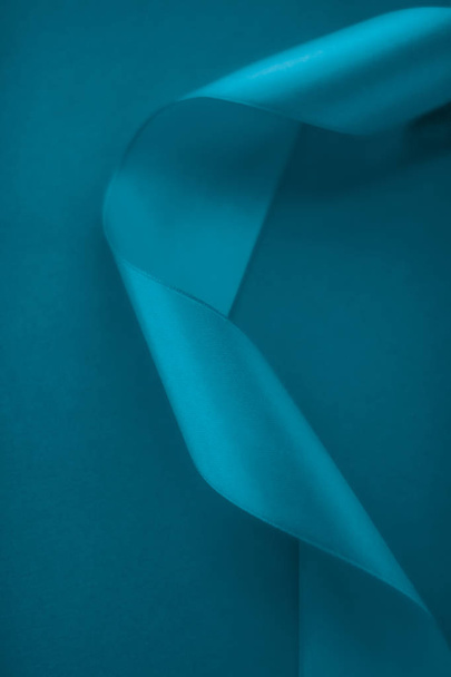 Abstract silk ribbon on aqua blue background, exclusive luxury b - Photo, Image