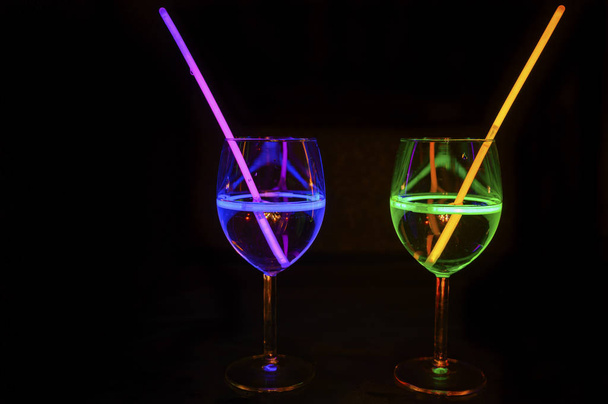 Mocktail wine glass filled with garnished refreshing alcohol liq - Photo, Image
