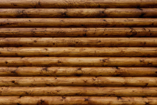 Wooden wall from logs as a background. - Photo, Image