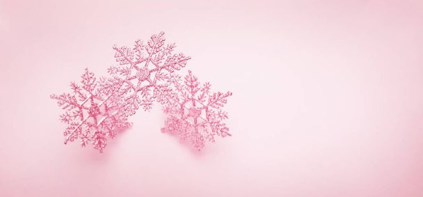 Festive winter background with decorative snowflakes in flying.  - Foto, imagen