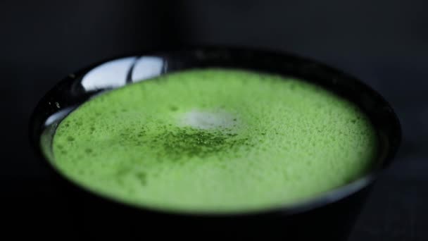 Japanese matcha latte green tea with foam - Кадри, відео