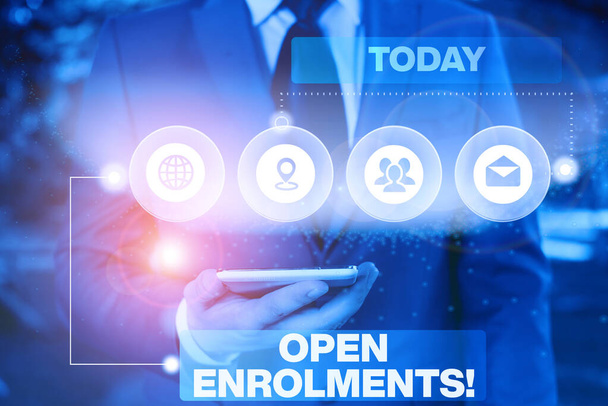 Conceptual hand writing showing Open Enrolments. Business photo showcasing when employees may make changes to elected fringe benefit Picture photo network scheme with modern smart device. - Photo, Image