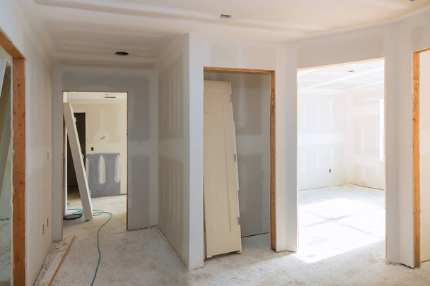 Drywall acabado industria de la construcción nueva casa construcción interior
 - Foto, imagen