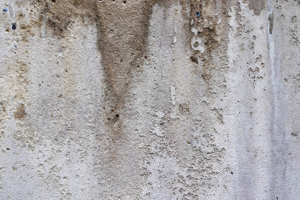 Detailed close up view on concrete wall textures with cracks and lots of stucture in high resolution - Фото, зображення