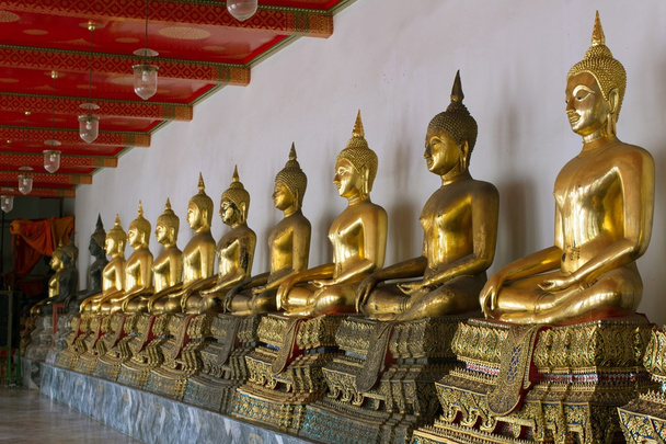 Rangée de Bouddha assis
 - Photo, image