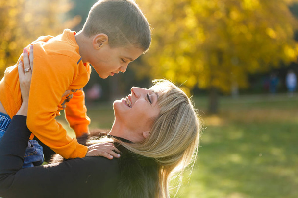 mother and son playing in park  - Photo, Image