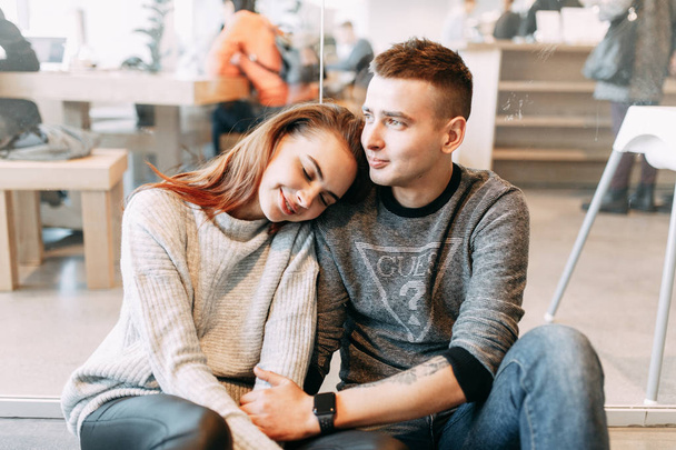 Bright emotions and laughter of loving people. Couple's photo shoot at the Mall.  - Zdjęcie, obraz