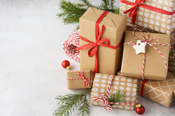 Big stack of wrapped Christmas gift boxes, toys and decoration. - Valokuva, kuva