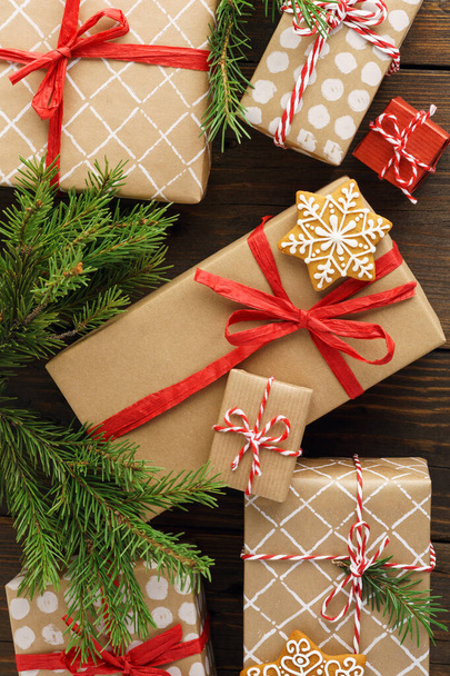 Christmas gift boxes and decoration on wooden background. - Φωτογραφία, εικόνα