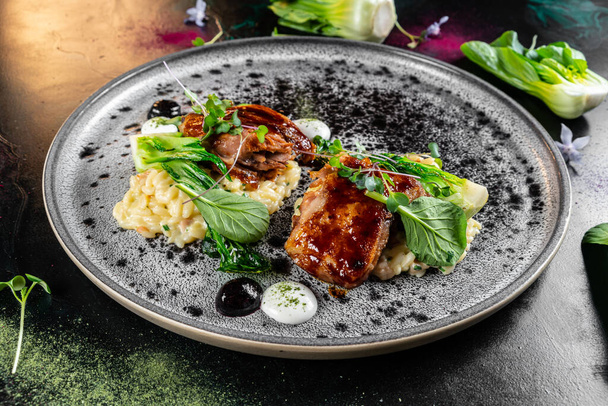 Grilled chicken breast. Fried chicken fillet and fresh vegetable salad of tomatoes, cucumbers and arugula leaves. Chicken meat with salad. Healthy food. Flat lay. Top view. Dark background - Fotografie, Obrázek